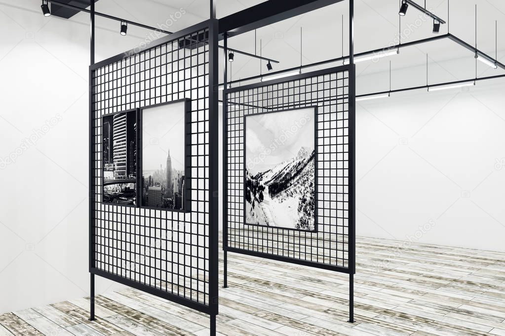 Svartvita fotografier upphängda i en lugn gallerimiljö